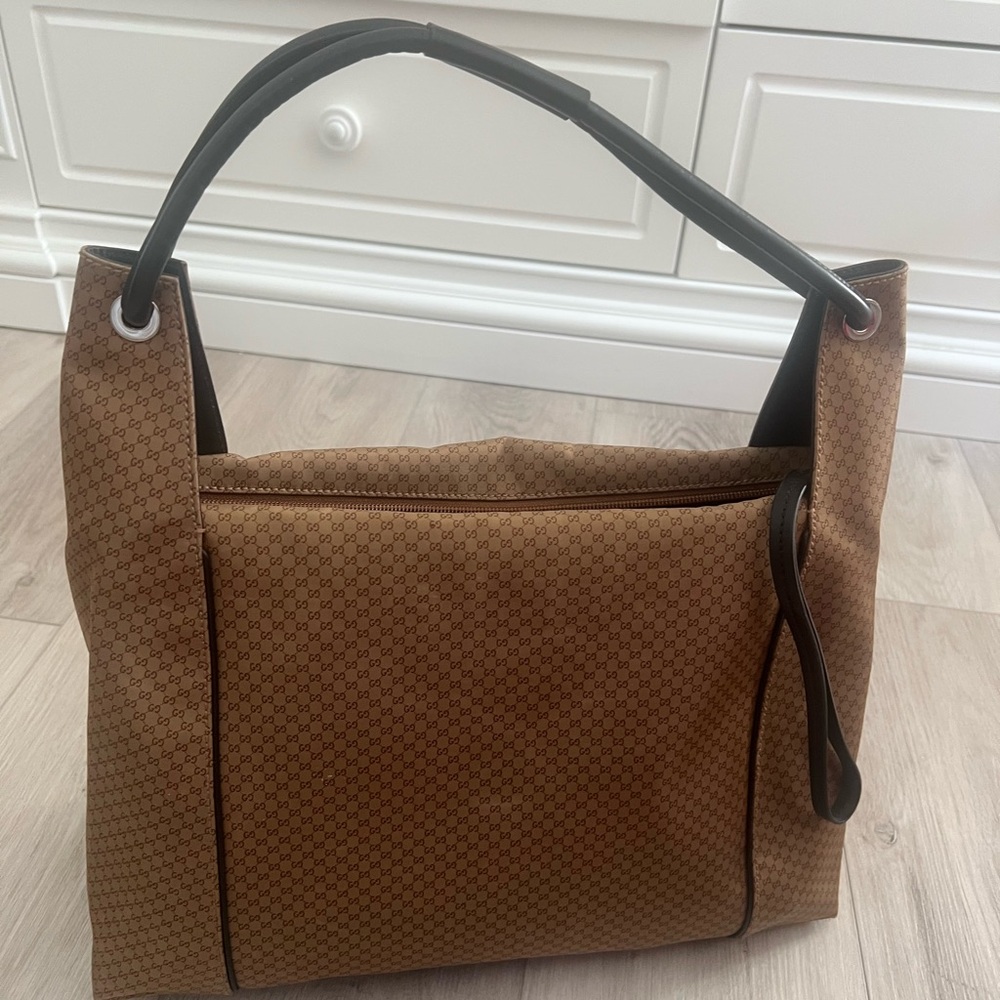 Gucci purse in light fabric so it’s essentially weightless